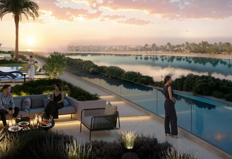 Residents on the podium terrace at sunset